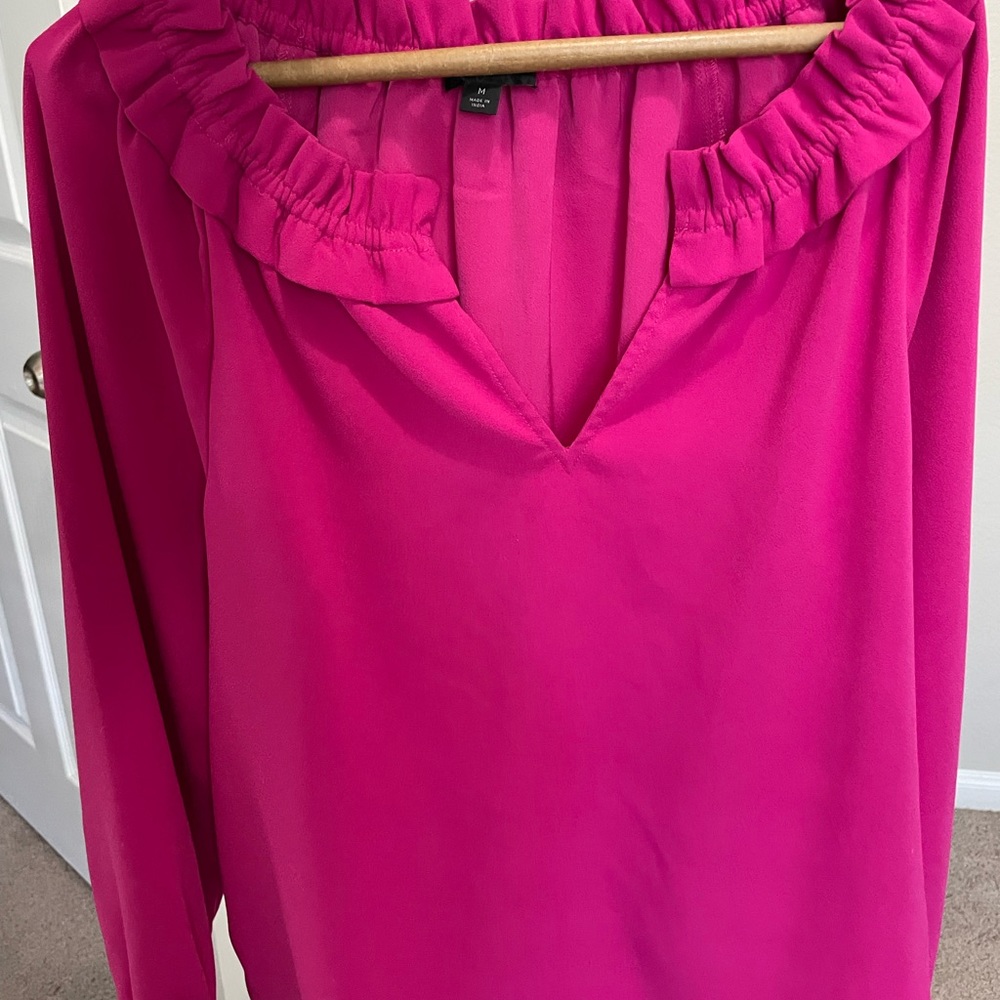 J.Crew cute medium pink blouse long sleeves has buttons so it’s adjustable.
